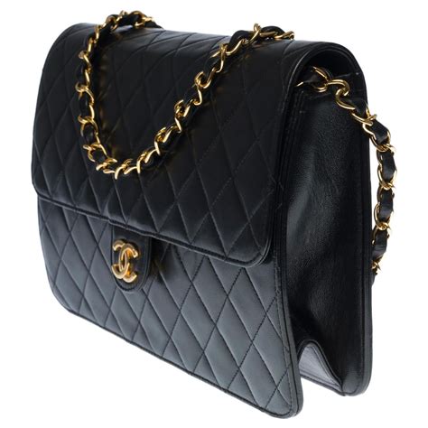 bolso chanel negro acolchado|Chanel bolsos.